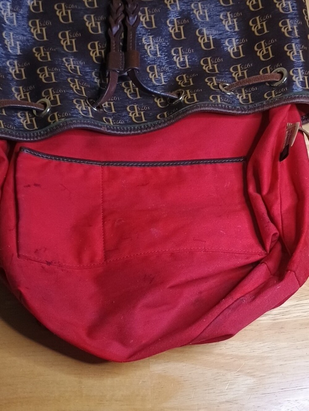Dooney & Bourke Sutton Brown Logo Drawstring Bucket Bag with Red Interior - Picture 7 of 12